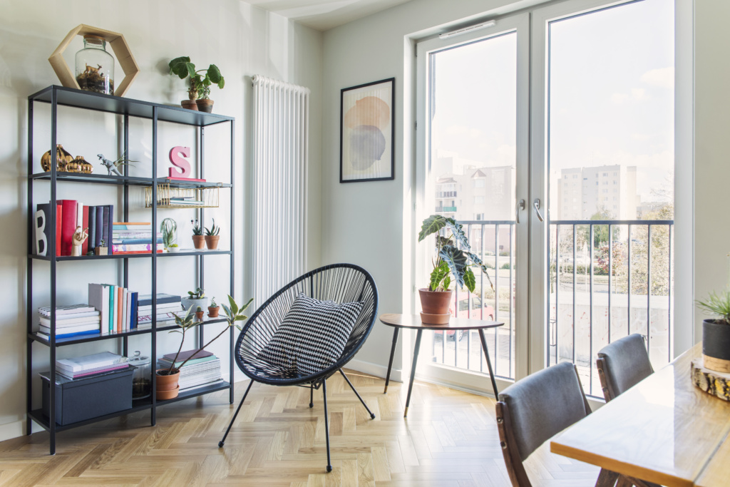 an airbnb room with a chair and a table